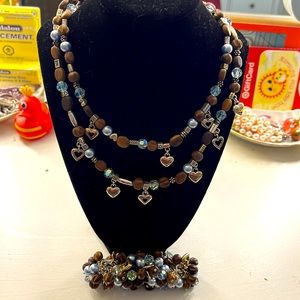 Brighton retired necklace and bracelet with a tin or bag.